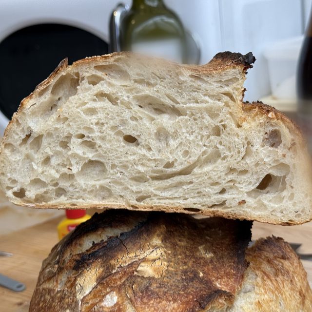 A slice resting on the loaf it came from